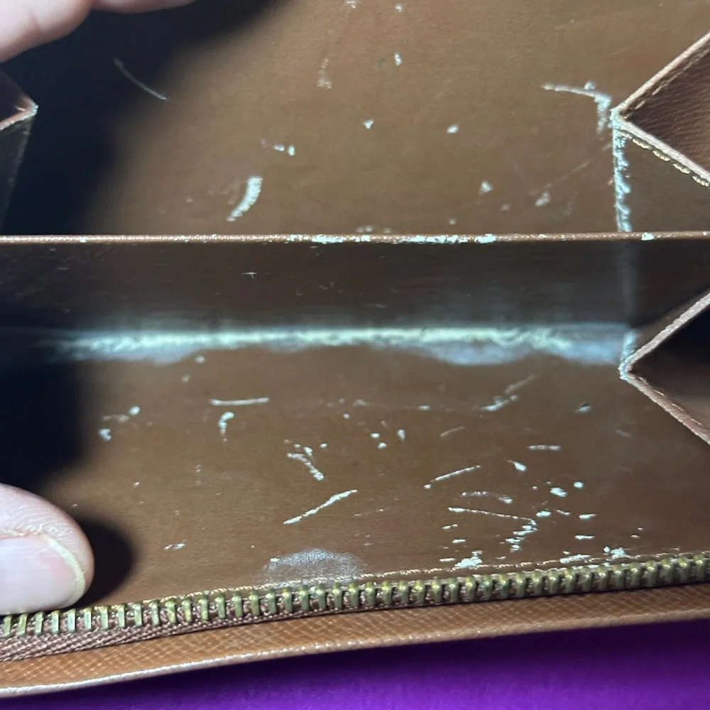 Louis Vuitton wallet.